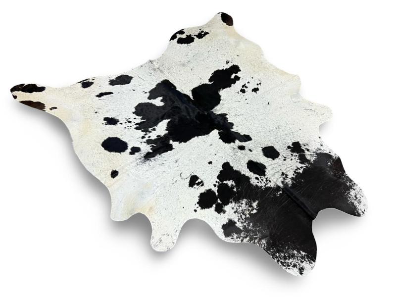 White cowhide with black neck and black speckled sides
