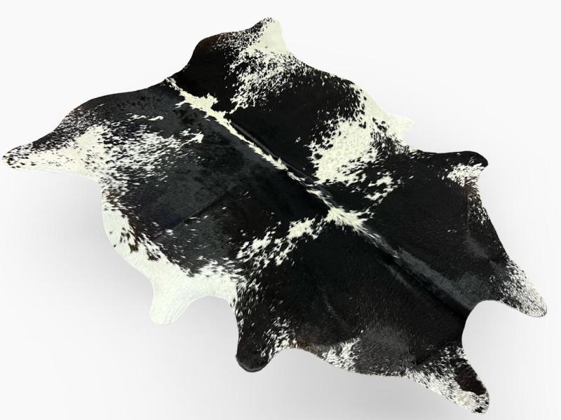 Black cowhide with white speckled spots