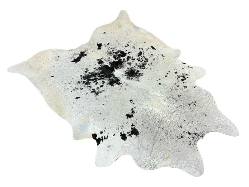 White cowhide with black speckled spots