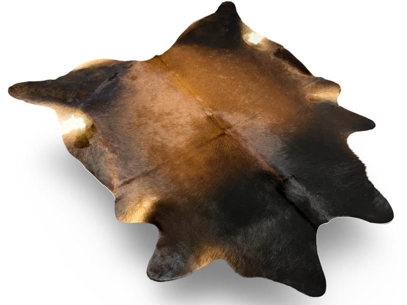 Dark color brown cowhide with light brown centre