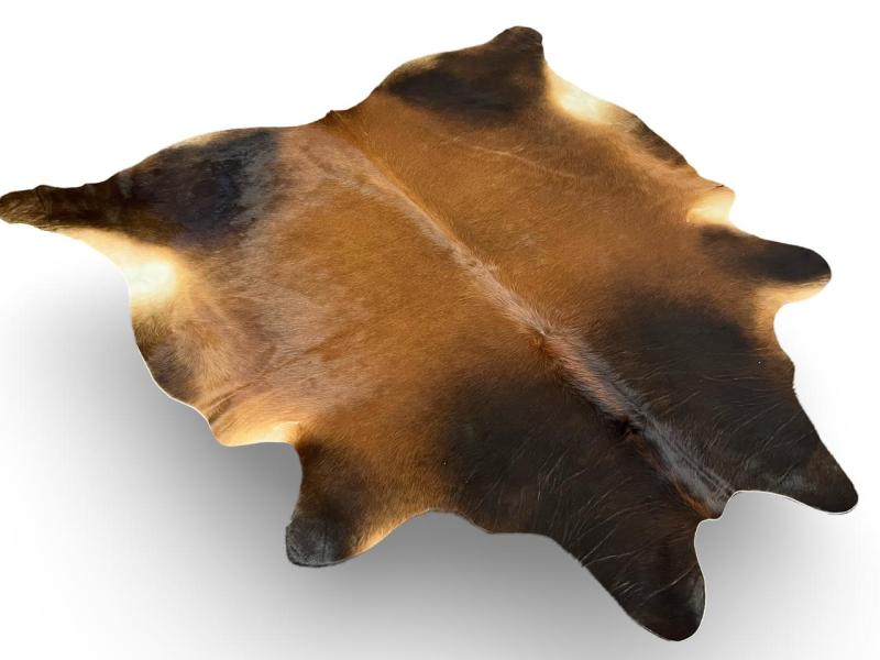 Dark brown cowhide with light brown centre