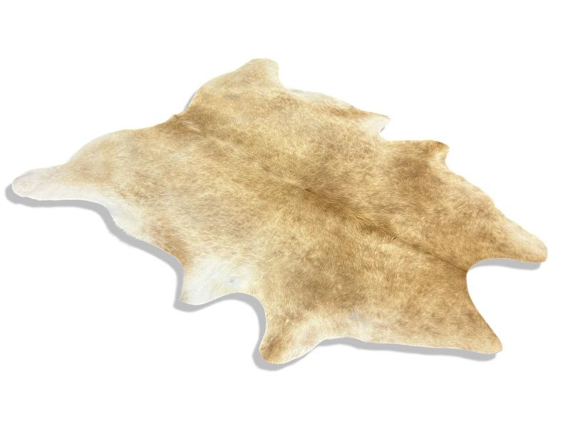 Light dunn color cowhide with darker patches