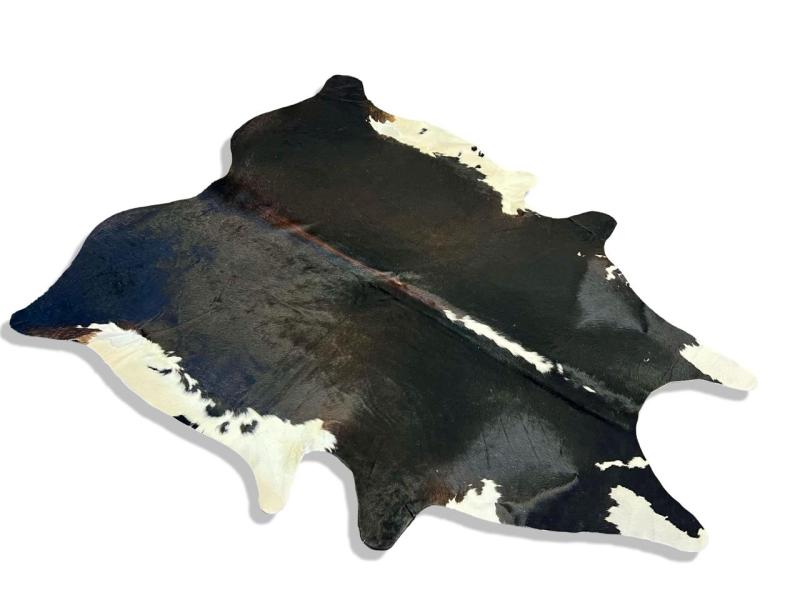 Tri color cowhide with black,brown and white edges and spine