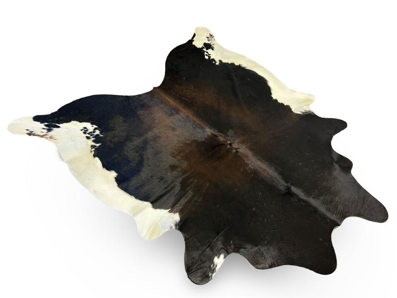 Tri color cowhide, black with chocolate brown centre and white sides