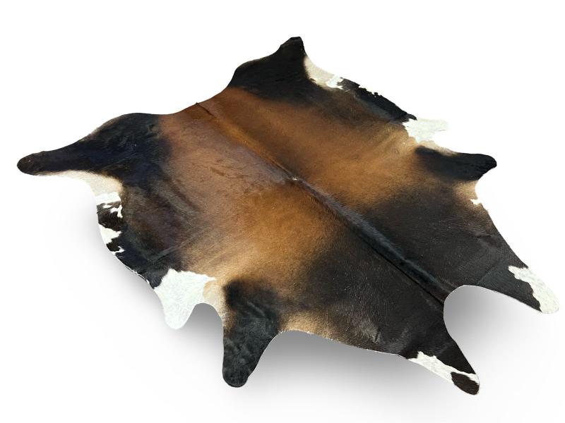 Tri color cowhide, black with brown centre and white ends