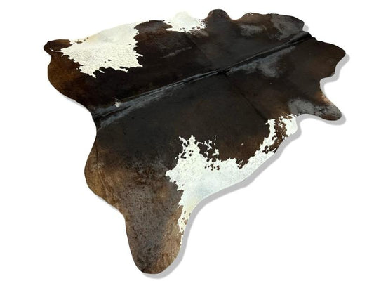 Black cowhide with white sides