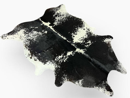 Black cowhide with white speckled spots