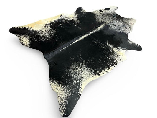 Black cowhide with white speckled sides and neck