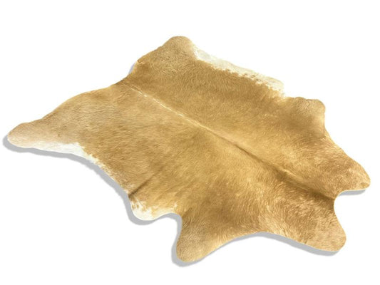 Light brown color cowhide with white edges