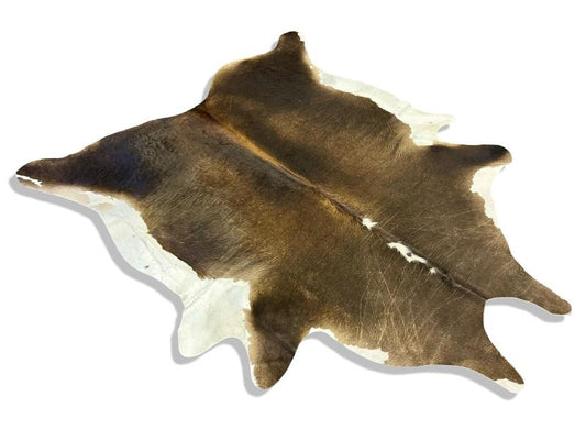 Dark brown color cowhide with white legs and neck