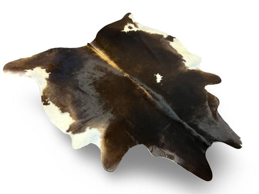 Dark brown cowhide with white under legs