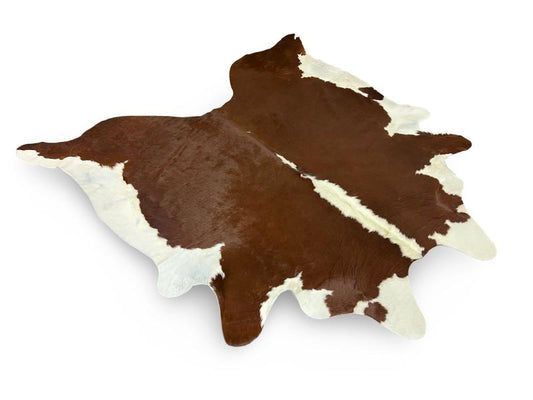 Dark brown cowhide with white ends and white spine