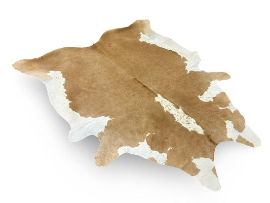 Light brown cowhide with white sides and centre spine