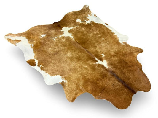 Dark brown cowhide with white spots
