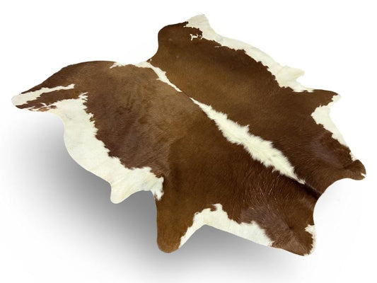 Dark brown cowhide with white spine and white sides