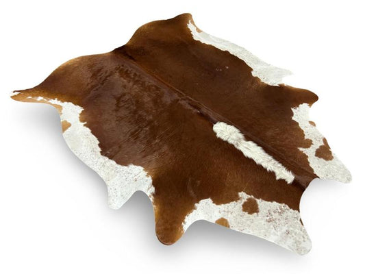 Dark brown cowhide with white ends and white spine