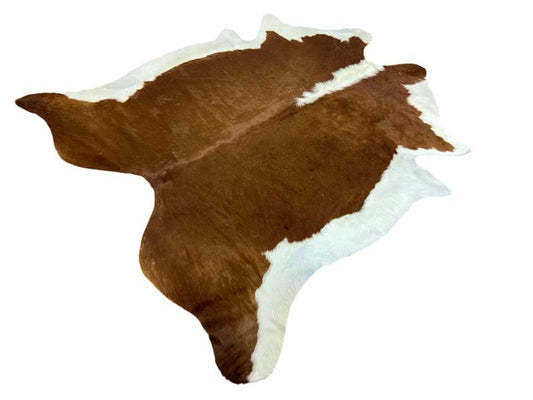 Brown color cowhide with white spine and sides