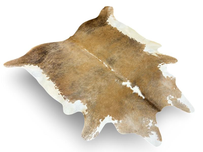 Light brown cowhide with white edges and white speckled sides