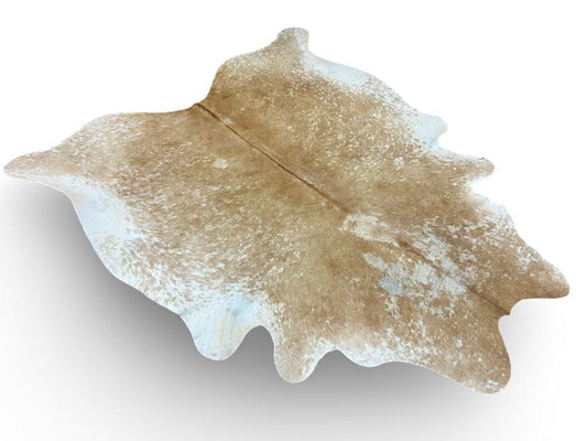 Light brown cowhide with white speckled spots on sides and neck