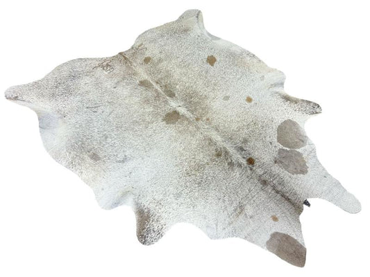 White cowhide with brown speckled spots