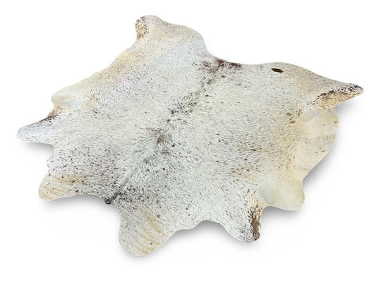 White cowhide with dark brown speckled spots