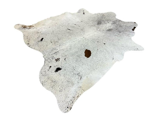 White cowhide with brown speckled spots
