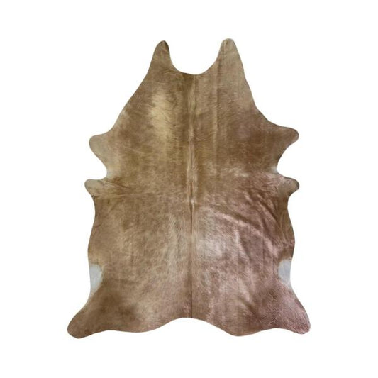Caramel cowhide with white patches under the back legs