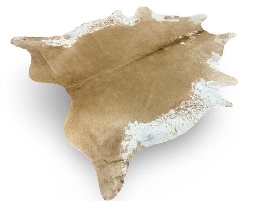 Light caramel color cowhide with white under legs