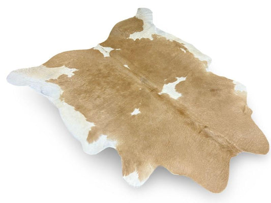 Light caramel cowhide with white spots