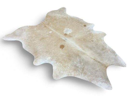 Light champaine color cowhide with white spine and ends