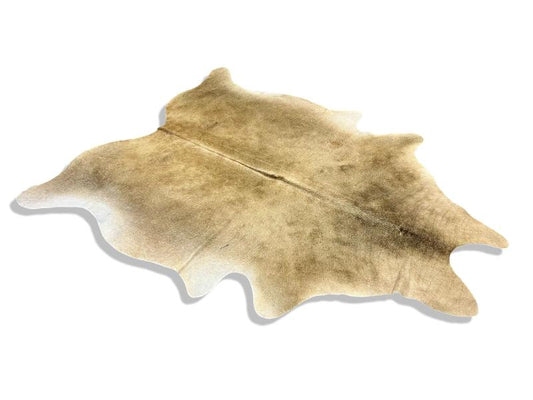 Light dunn colour cowhide with white edges and darker spine