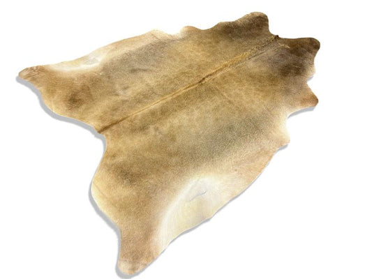 Light dunn color cowhide with white under legs