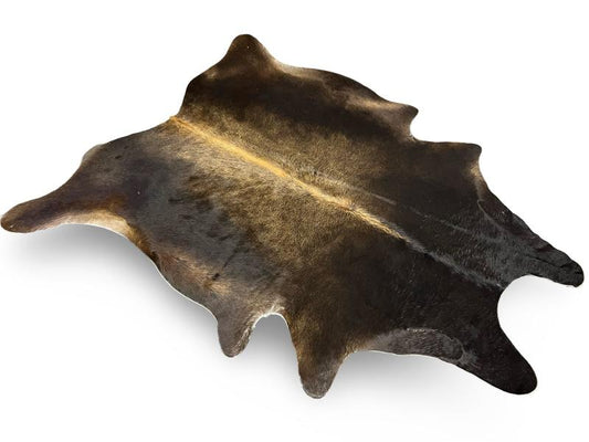 Dark dunn color cowhide with light brown spine
