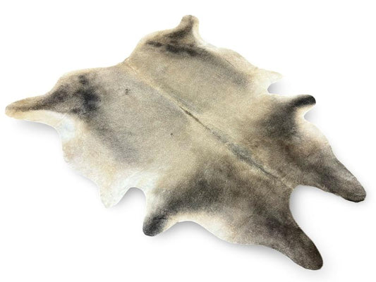 Dark dunn color cowhide with light dunn centre and white under legs