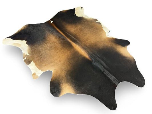 Dark dunn color cowhide with light brown centre and white ends
