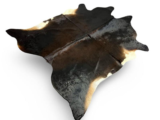 Dark dunn color cowhide with white under legs