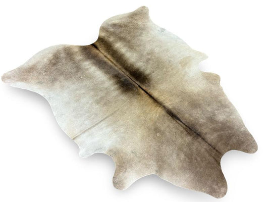 Light dunn color cowhide with dark dunn spine