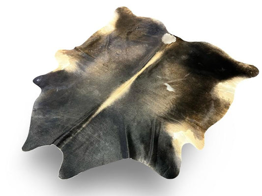 Dark dunn color cowhide with light brown spine and under legs