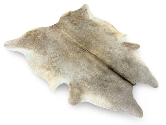 Light dunn color cowhide with white under legs
