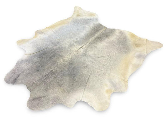 Light grey color cowhide with darker grey neck and spine