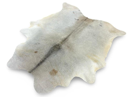 Light grey cowhide with brown spots and dark grey spine