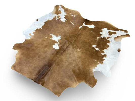 Nguni type cowhide.Light brown cowhide with white patches