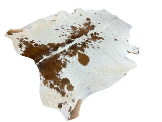 Nguni type cowhide,white with dark brown centre and brown speckled spots on side