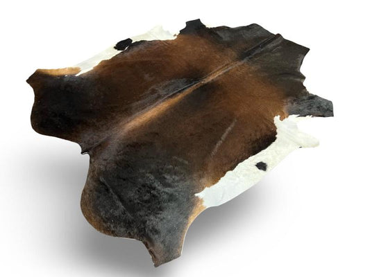 Nguni type cowhide.Tri color, mix of black and dark brown with white sides