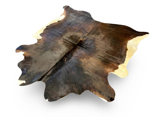 Black cowhide with brown centre and white edges