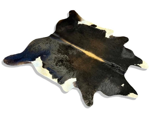 Tri colour cowhide with white under legs and brown spine