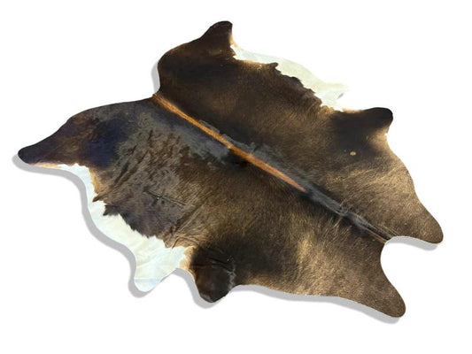 Tri color cowhide with dark brown,light brown spine and white