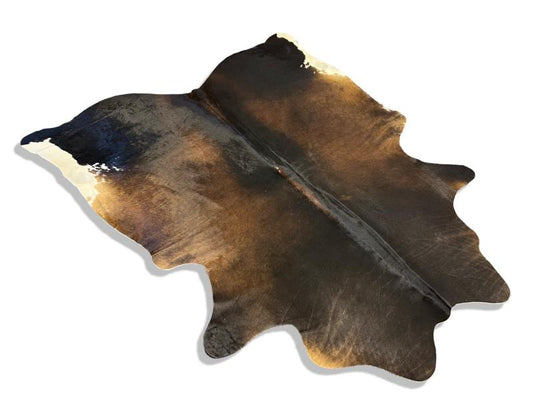 Tri color cowhide,black with brown middle and white back legs