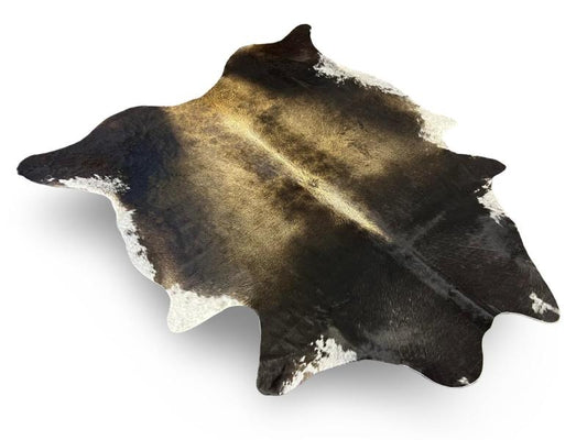 Black cowhide with white under legs and light brown centre