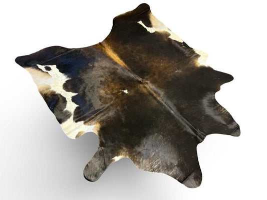 Tri color cowhide,mix of black with light brown in the middle and white on ends